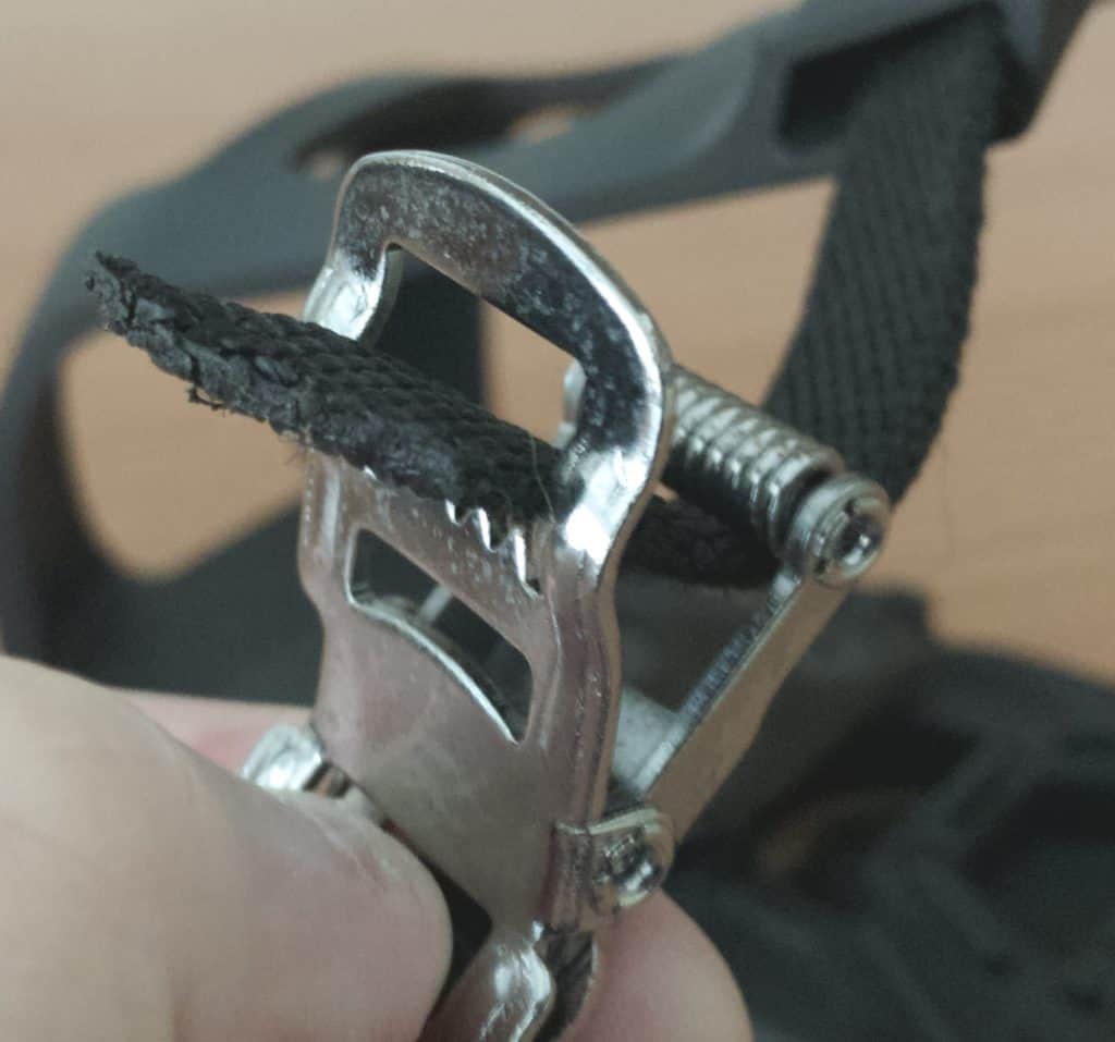 Closeup of Opening Toe Cage Strap Clasp