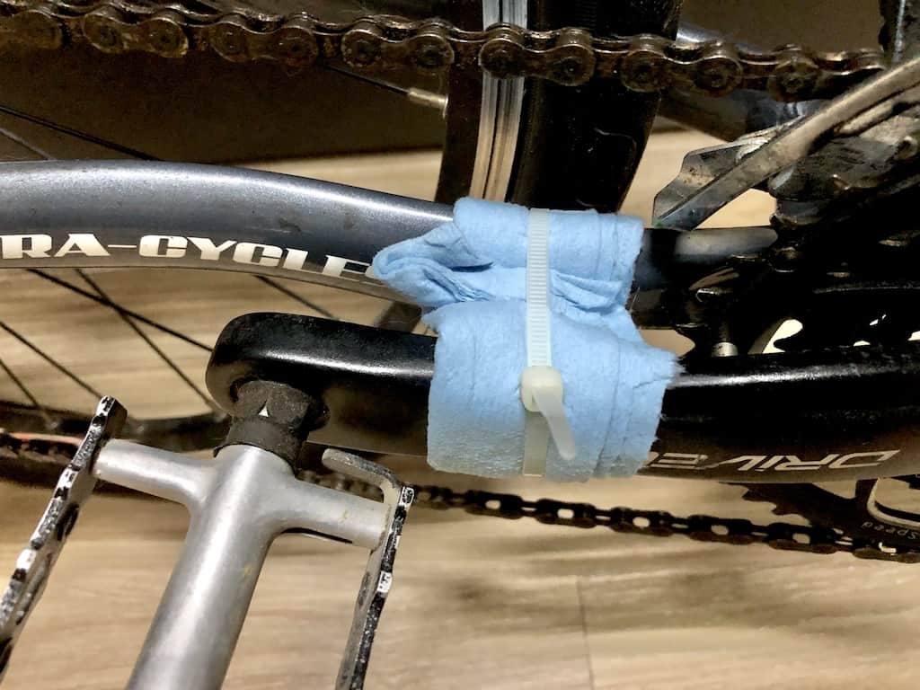 zip tie holding crank to the seat stay