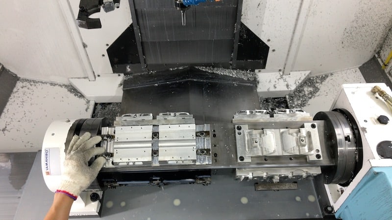 looking down at the pedals on the CNC plate